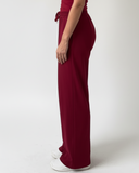 side of red jogger pants